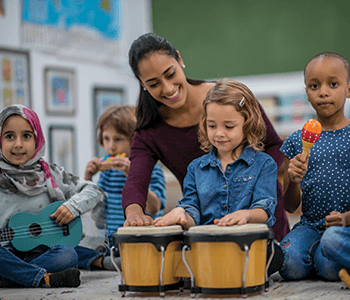 Student teacher having music time with her students