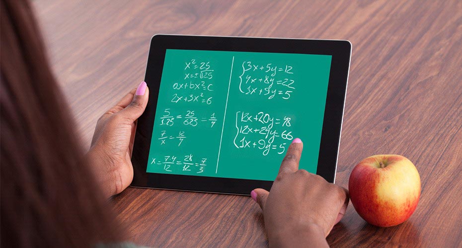 student holding electronic notepad with math equation displayed