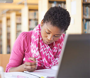 african american female student studying for her master's in education degree